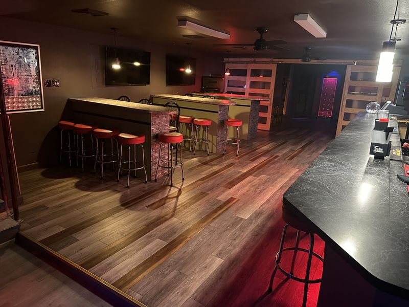 Seating and TVs at Flirt